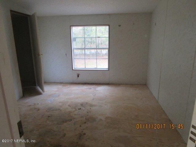 45072 Bismark Road Callahan, FL 32011 - Photo 23 of 39 an empty room with a window