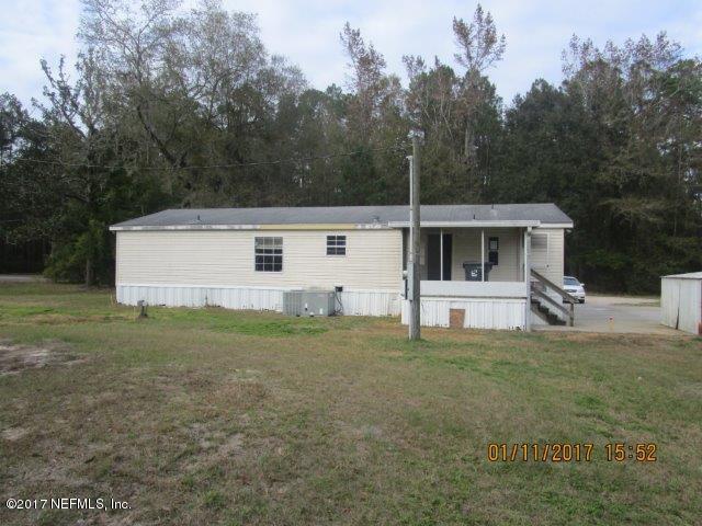 45072 Bismark Road Callahan, FL 32011 - Photo 36 of 39 a view of a house with backyard