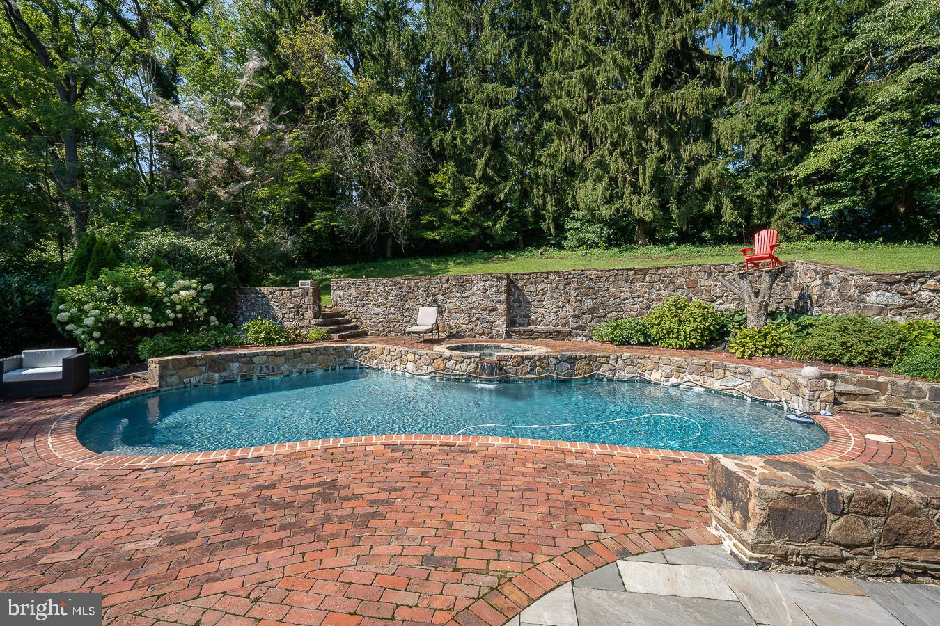 2207 Chester Springs Road Chester Springs, PA 19425 - Photo 57 of 67 Pool with hot tub and brick surround
