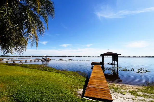a view of a lake with a garden