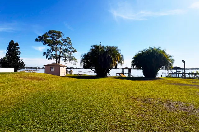 a view of a swimming pool with an ocean view