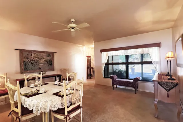 a bedroom with bed and a flat screen tv