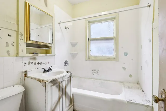 a bathroom with a sink and a bathtub