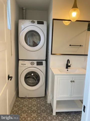 an empty room with a kitchen