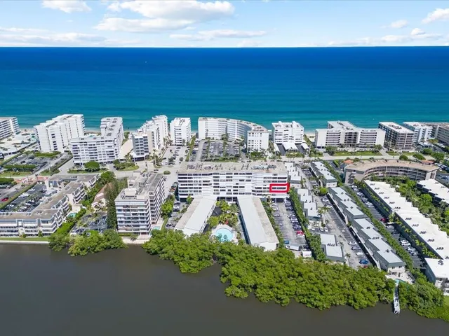 a view of a city with an ocean view