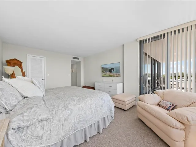 a bathroom with a granite countertop sink mirror and double