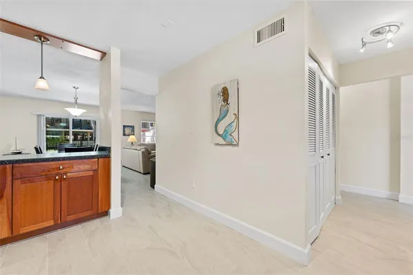 a view of a kitchen and window