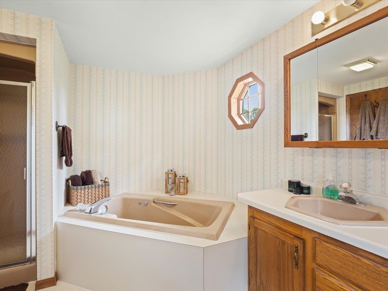 8500 Manchester Road Capron, IL 61012 - Photo 29 of 51 a bathroom with a sink and a mirror