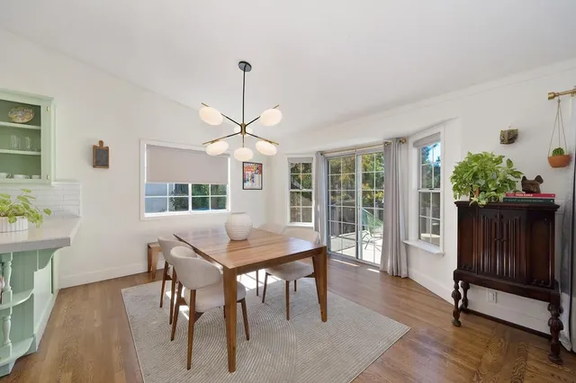 a view of living room with furniture and flat screen tv
