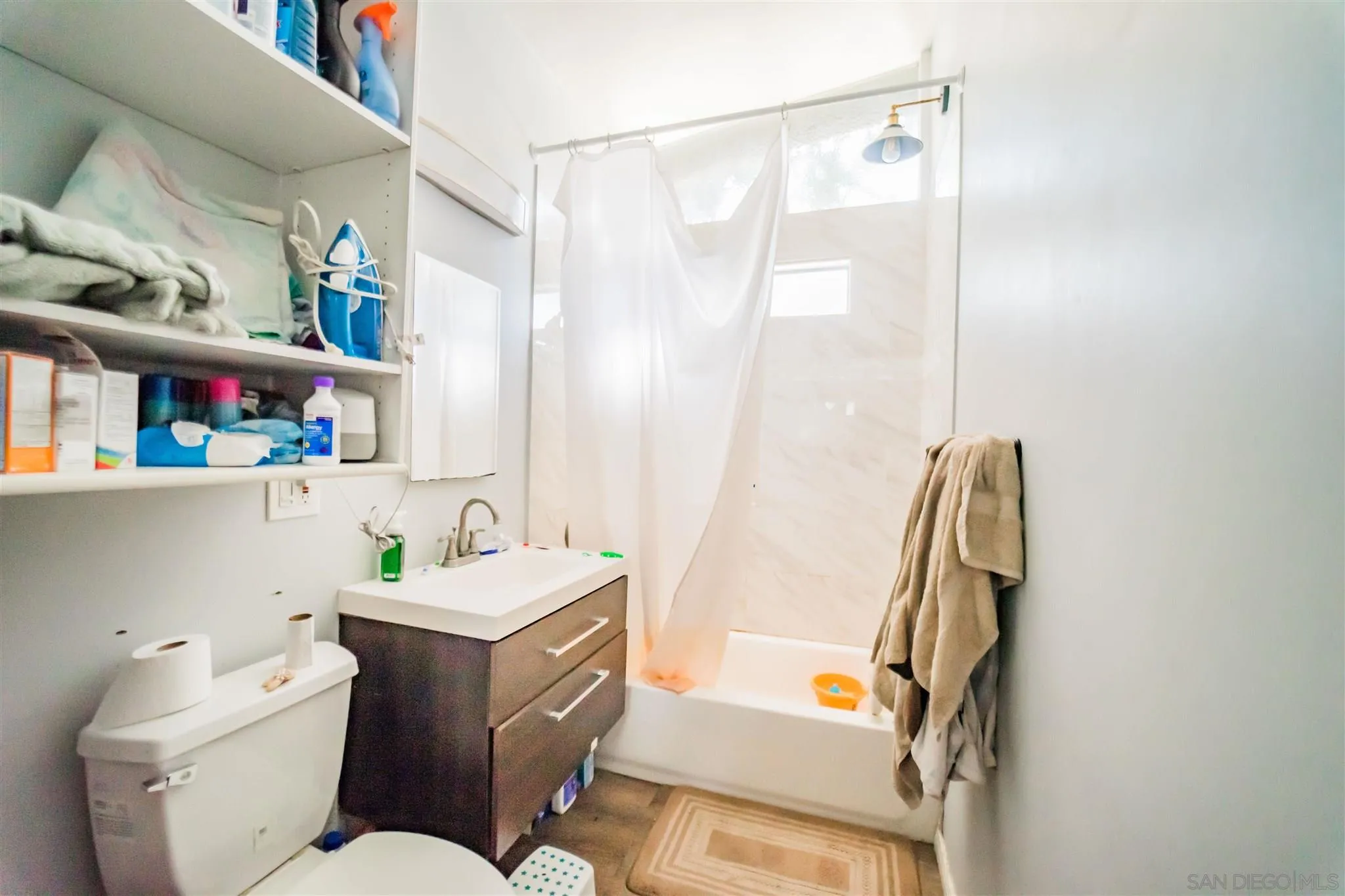 14149 Frame Road Poway, CA 92064 - Photo 16 of 28 a bathroom with a sink toilet and shower