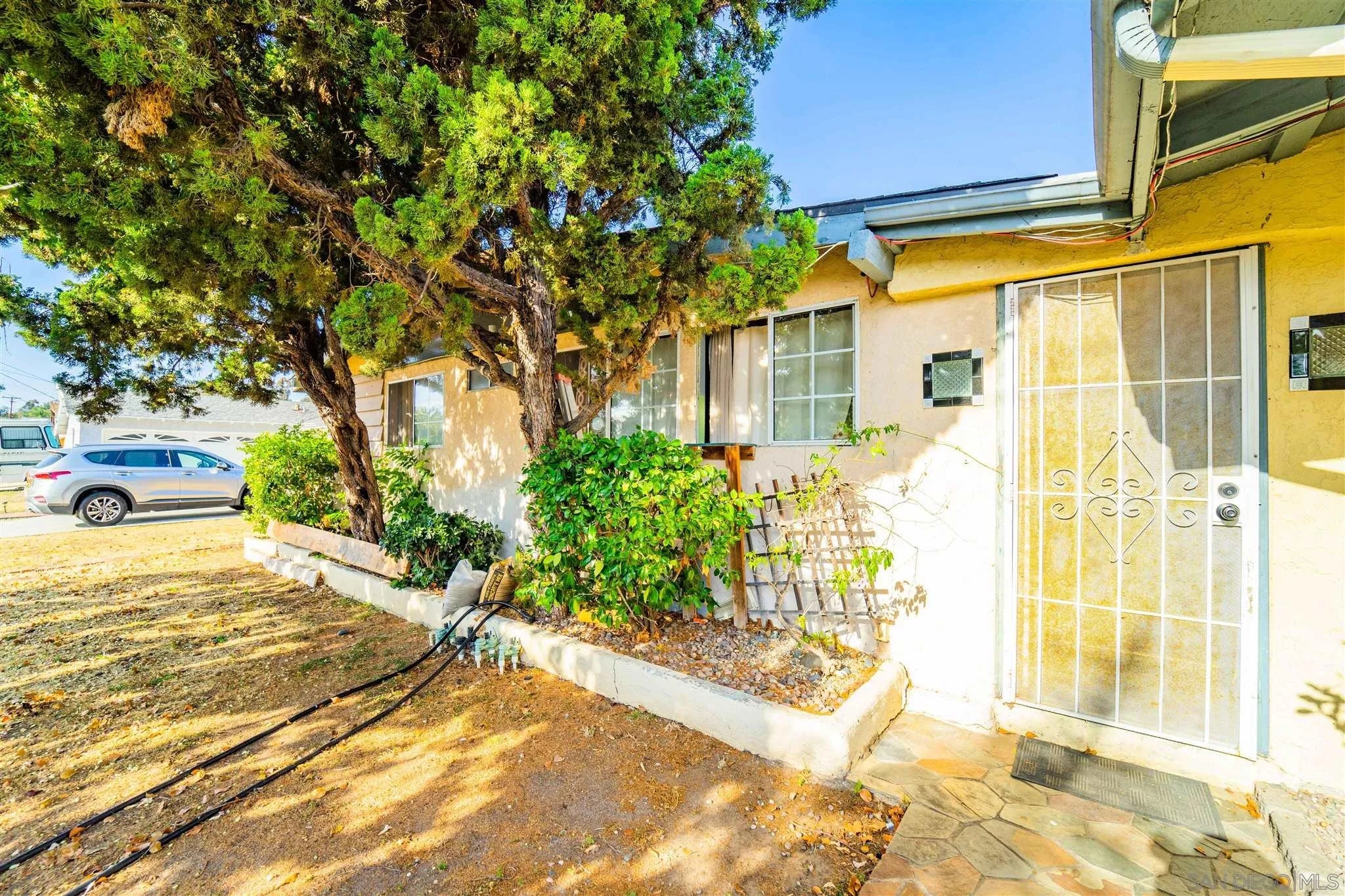 14149 Frame Road Poway, CA 92064 - Photo 3 of 28 a view of a house with a backyard