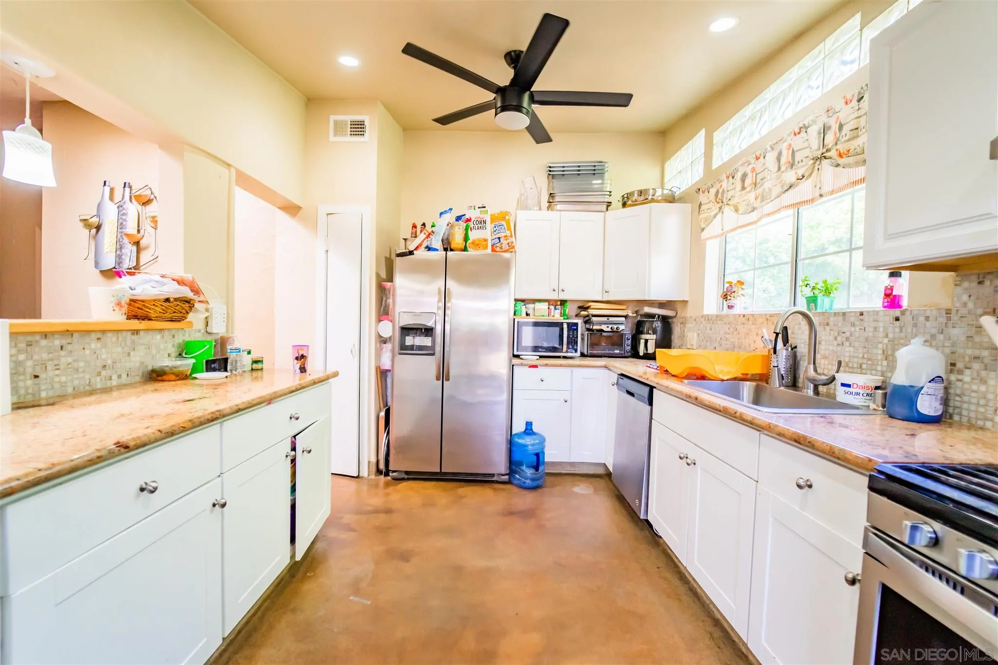 14149 Frame Road Poway, CA 92064 - Photo 10 of 28 a kitchen with refrigerator and window