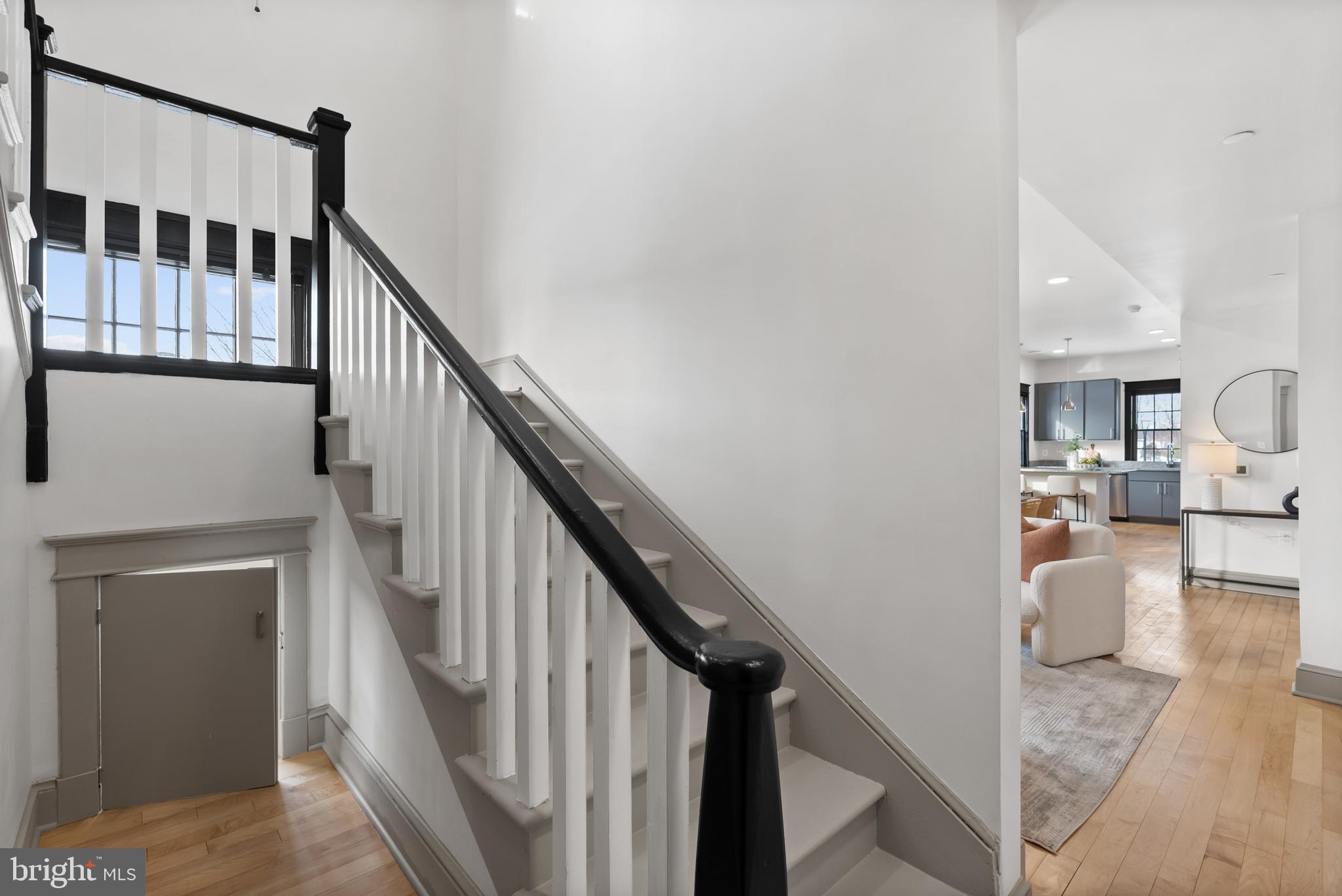 9071 Power House Road, Unit 101 Lorton, VA 22079 - Photo 16 of 47 Hidden beneath the stairs is a secret mini-closet.