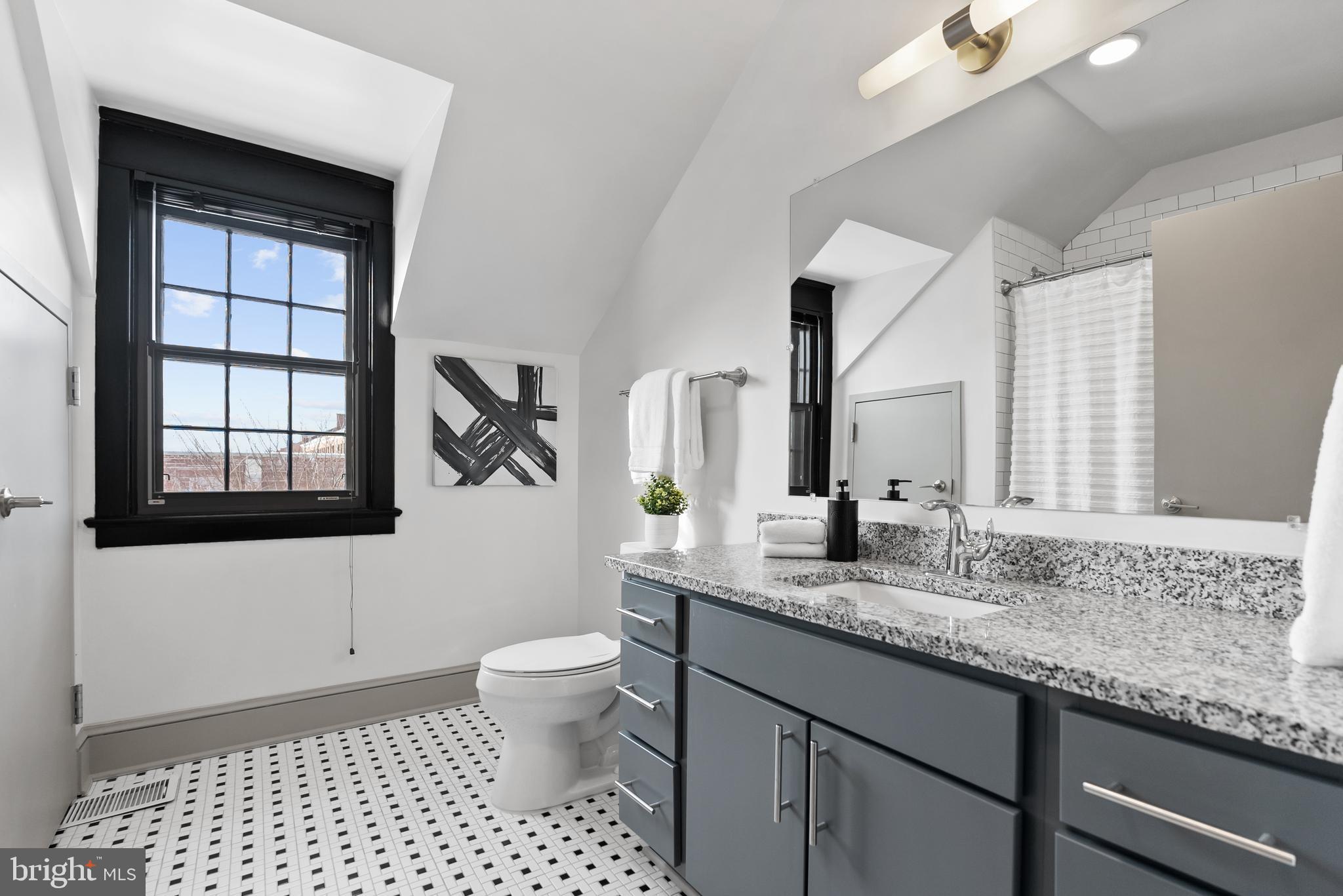 9071 Power House Road, Unit 101 Lorton, VA 22079 - Photo 20 of 47 Natural light in the bathroom.