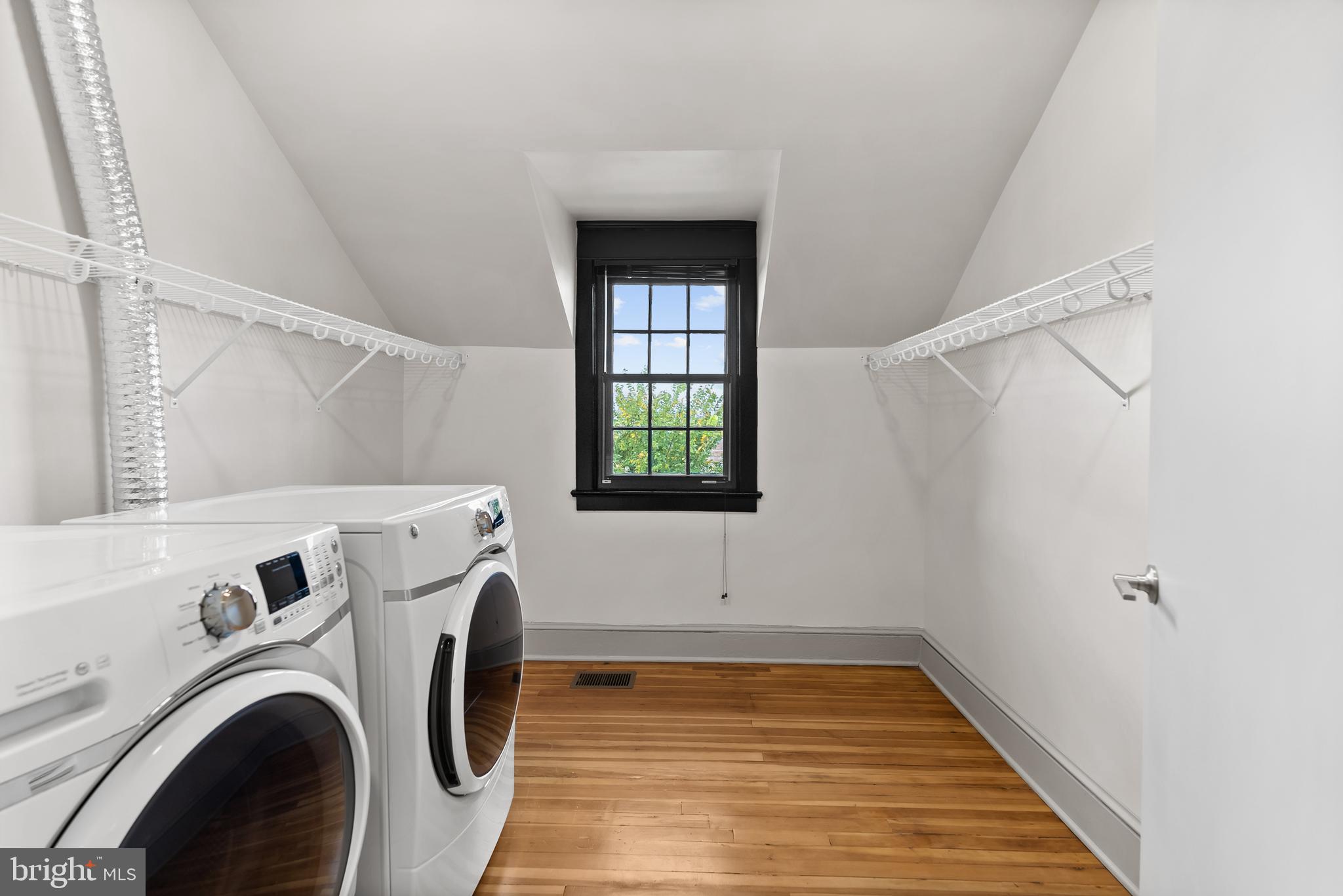 9071 Power House Road, Unit 101 Lorton, VA 22079 - Photo 27 of 47 A large laundry room and walk-in closet.