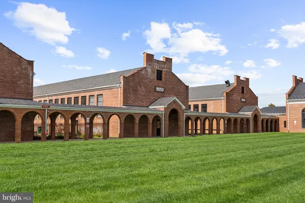 a front view of building with garden