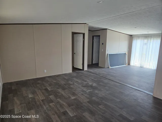 a view of a livingroom with an empty space