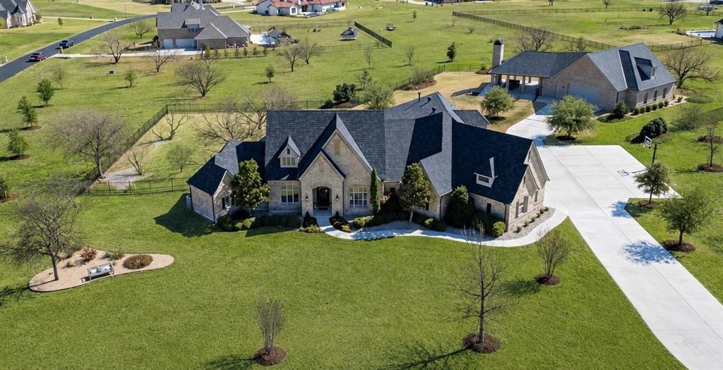 301 Rustic View Lane Aledo, TX 76008 - Photo 1 of 40 an aerial view of a house with swimming pool and garden