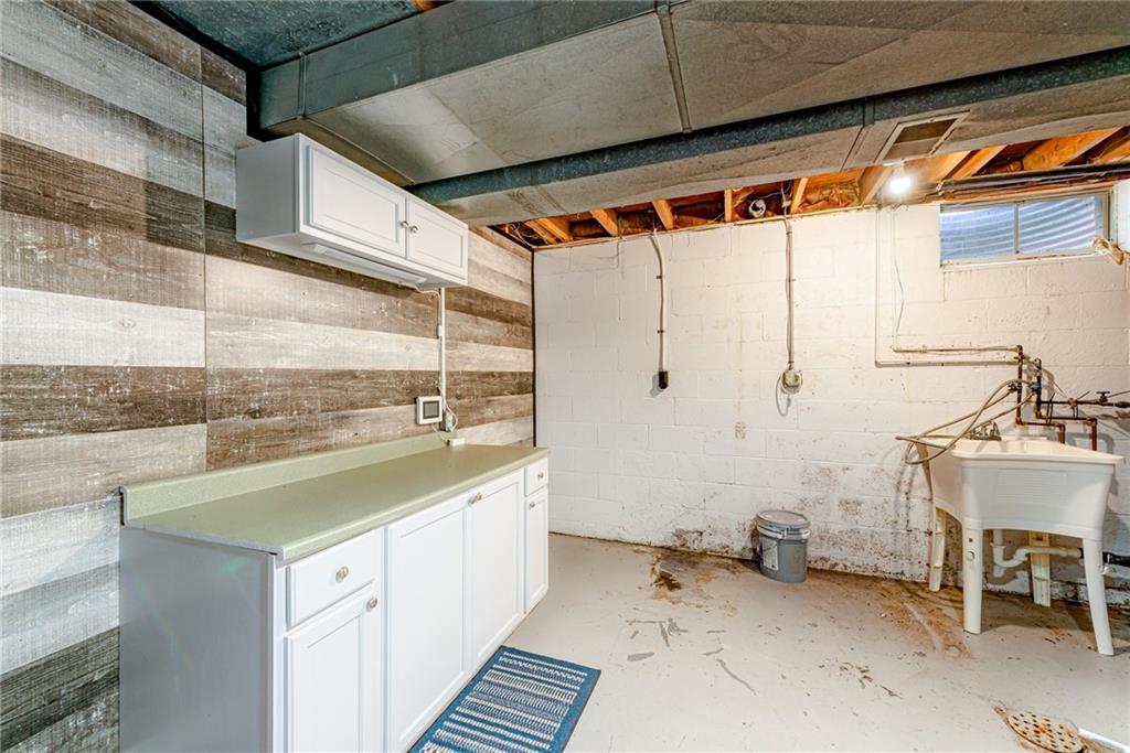 486 Engle Road Industry, PA 15052 - Photo 24 of 38 a bathroom with a sink and a bathtub