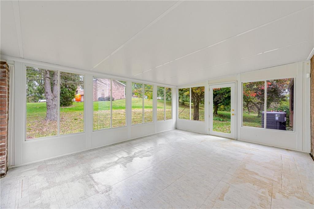 486 Engle Road Industry, PA 15052 - Photo 25 of 38 a view of an empty room with windows and a balcony