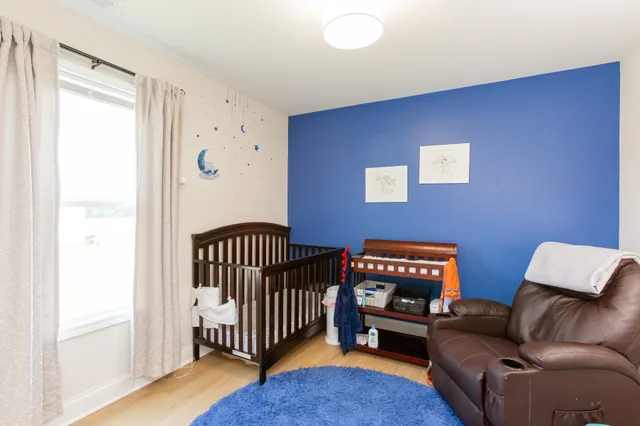 a livingroom with furniture and a window