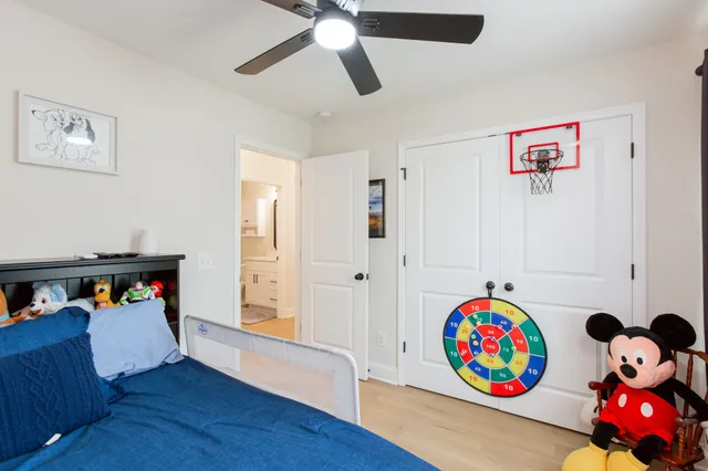 a play room with toys and wooden floor