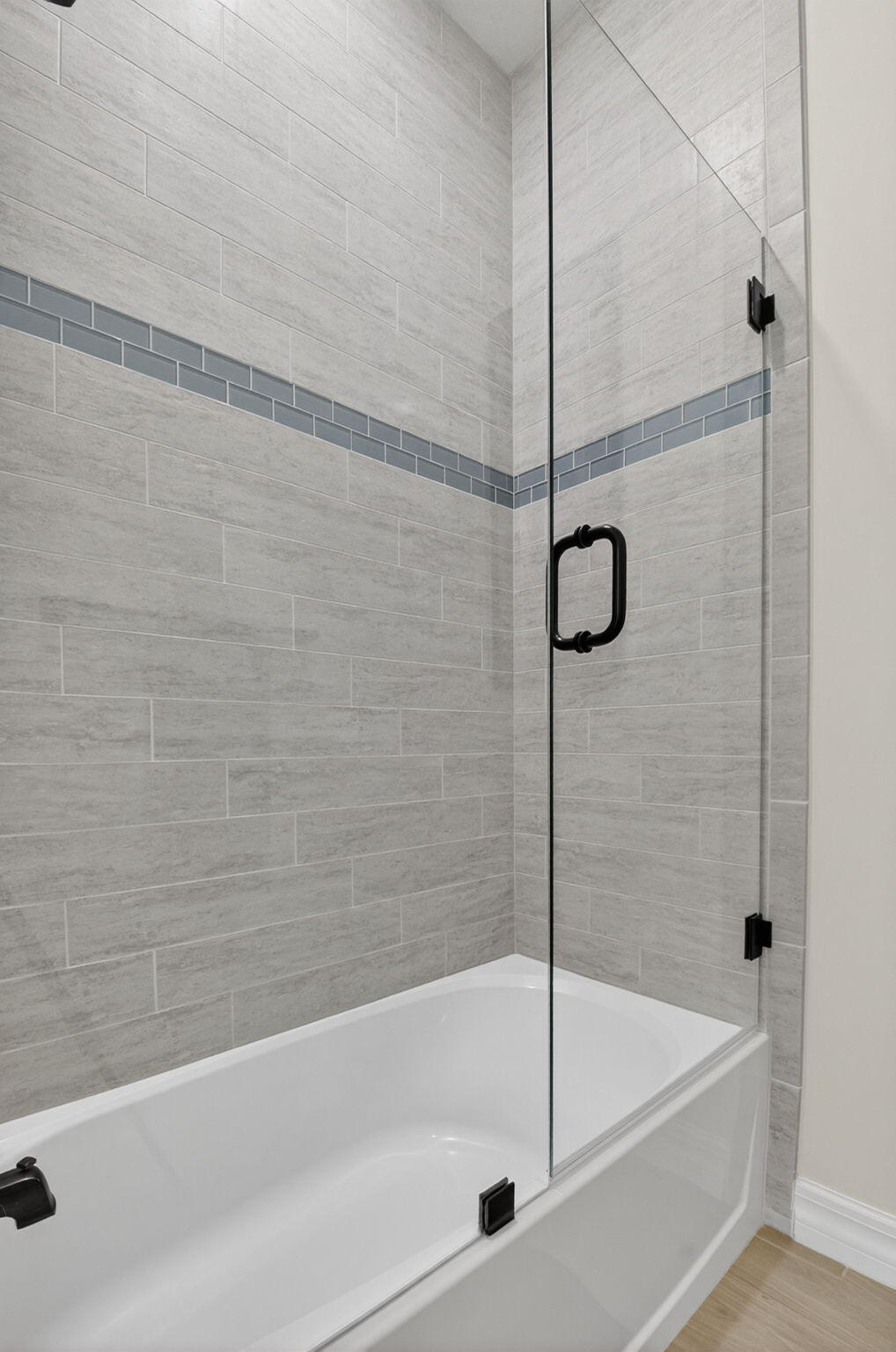 21956 Canadensis Circle, Unit 201 Boca Raton, FL 33428 - Photo 36 of 47 a bathroom with a bathtub