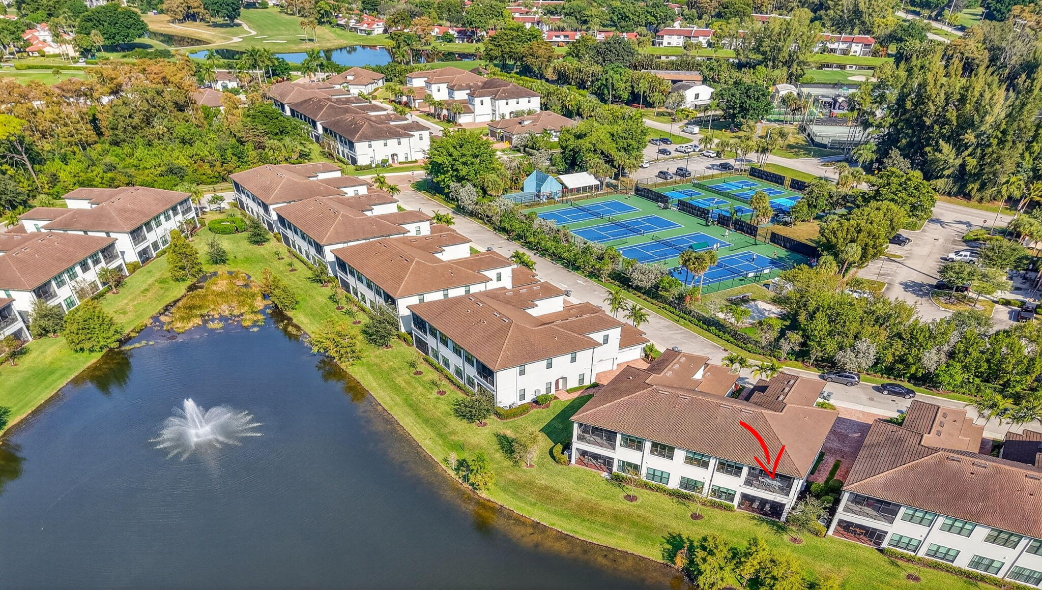 21956 Canadensis Circle, Unit 201 Boca Raton, FL 33428 - Photo 41 of 47 an aerial view of a house