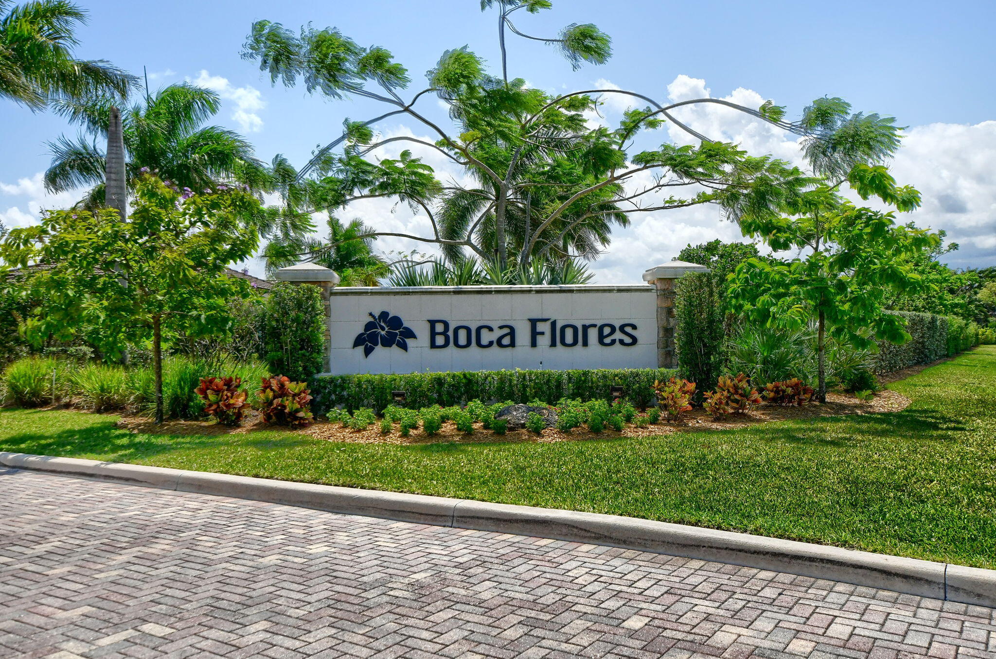 21956 Canadensis Circle, Unit 201 Boca Raton, FL 33428 - Photo 43 of 47 a sign on a street sign