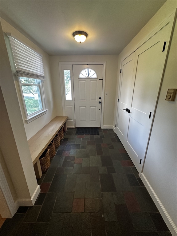 46 Sunset Road, Unit 46 Needham, MA 02494 - Photo 3 of 13 a view of entryway with window and hardwood floor