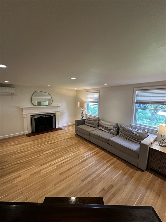 46 Sunset Road, Unit 46 Needham, MA 02494 - Photo 4 of 13 a view of living room with furniture and a fireplace