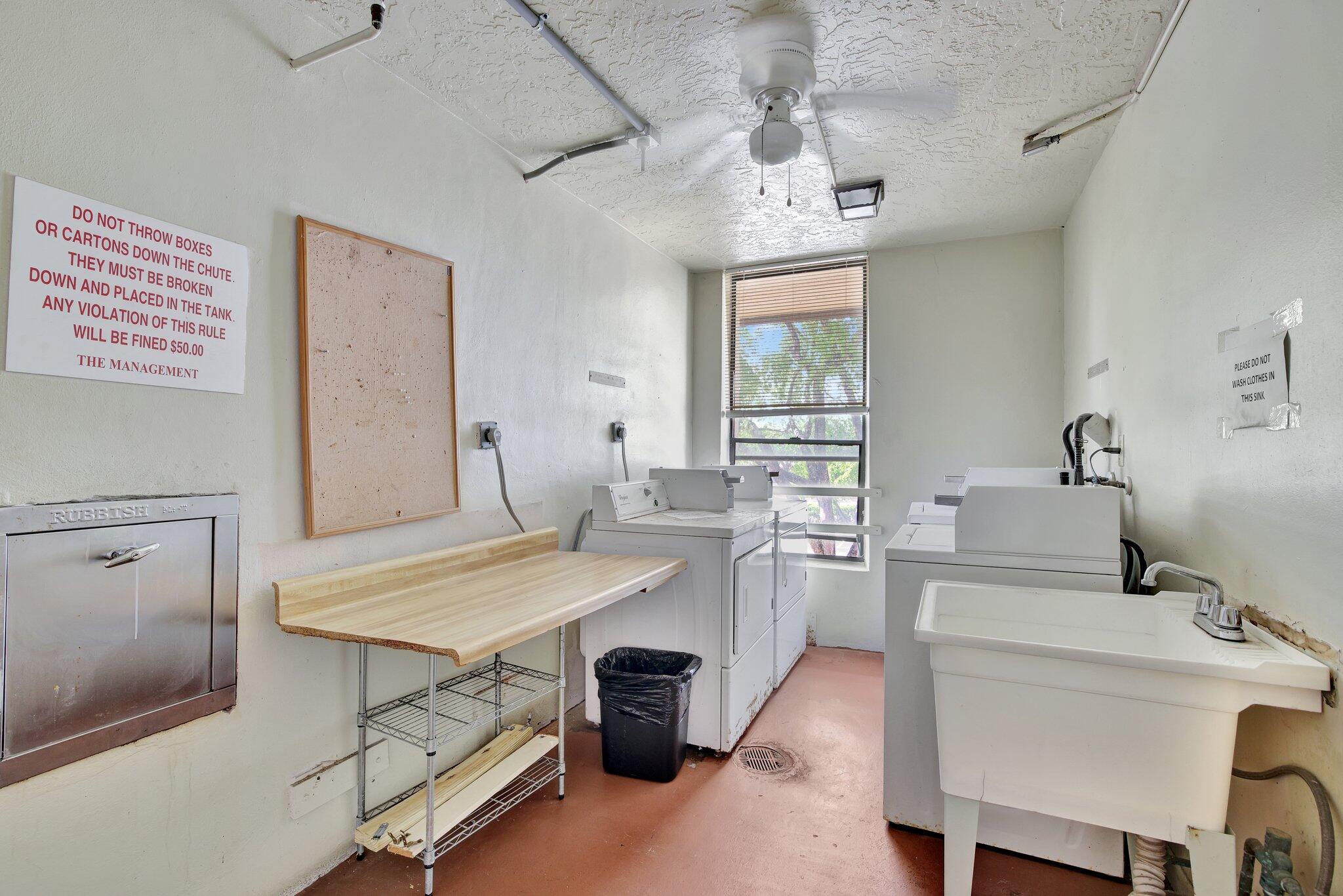 7650 West McNab Road, Unit 210 Tamarac, FL 33321 - Photo 13 of 13 Laundry Room