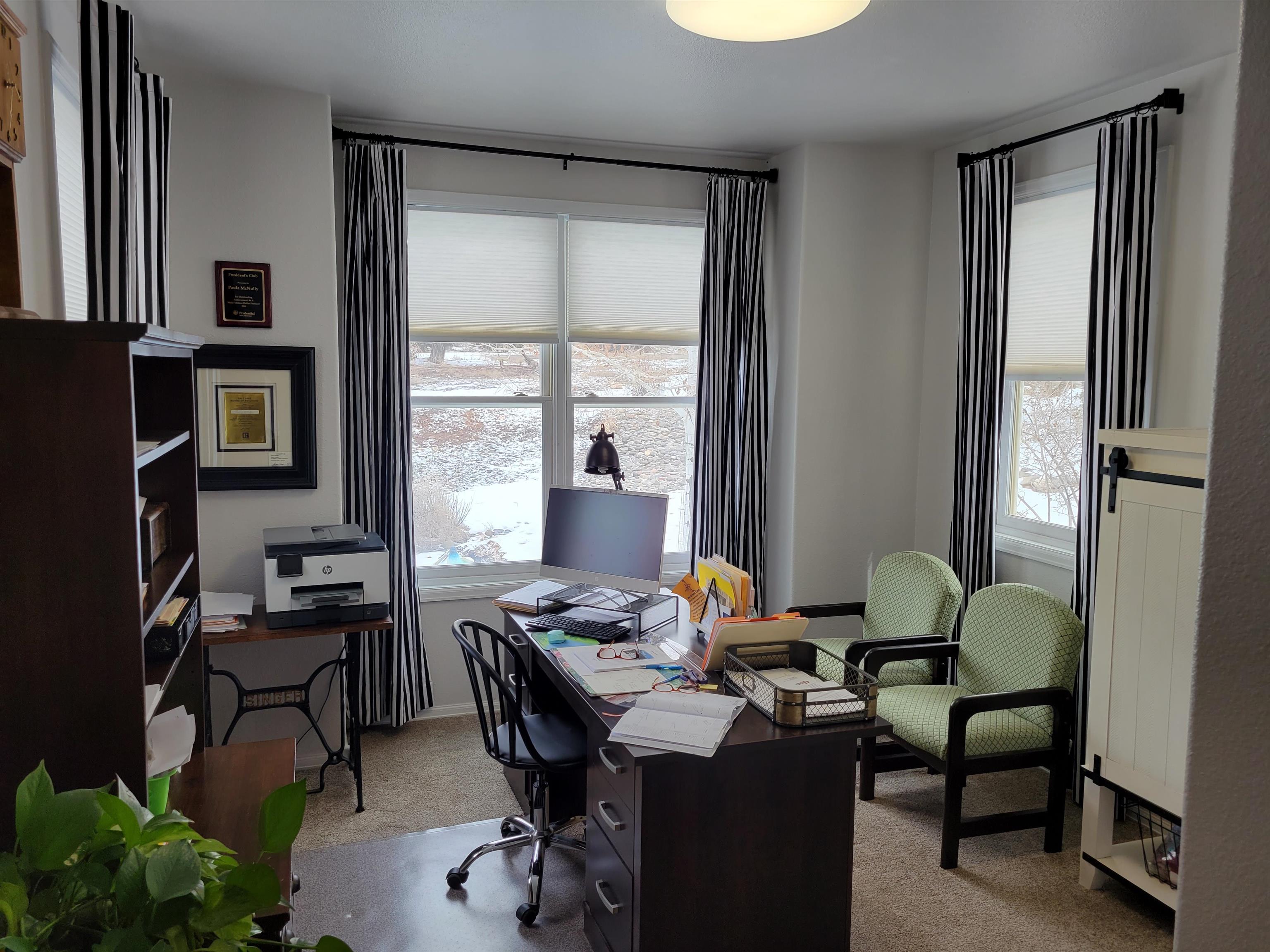 15753 Heavens View Road Cedaredge, CO 81413 - Photo 14 of 33 a workspace with furniture and a window