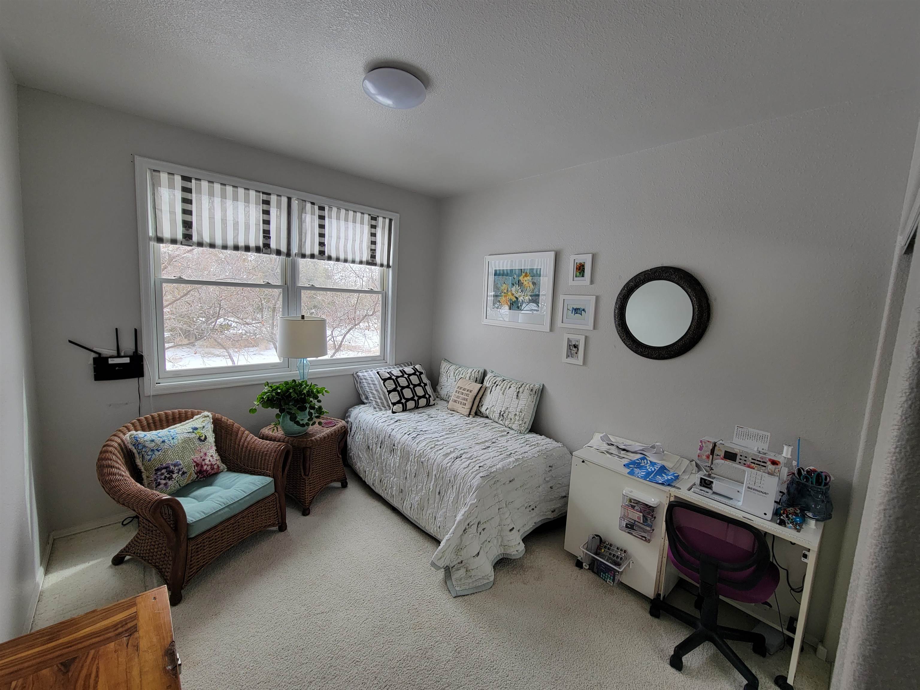 15753 Heavens View Road Cedaredge, CO 81413 - Photo 17 of 33 a living room with furniture and a window