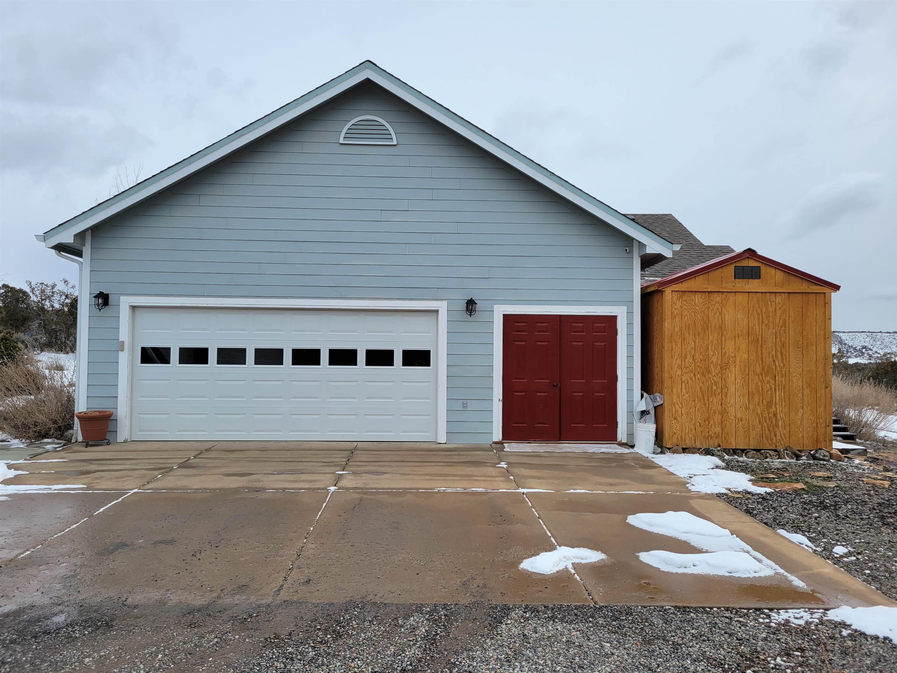 15753 Heavens View Road Cedaredge, CO 81413 - Photo 26 of 33 a front view of a house with a garage