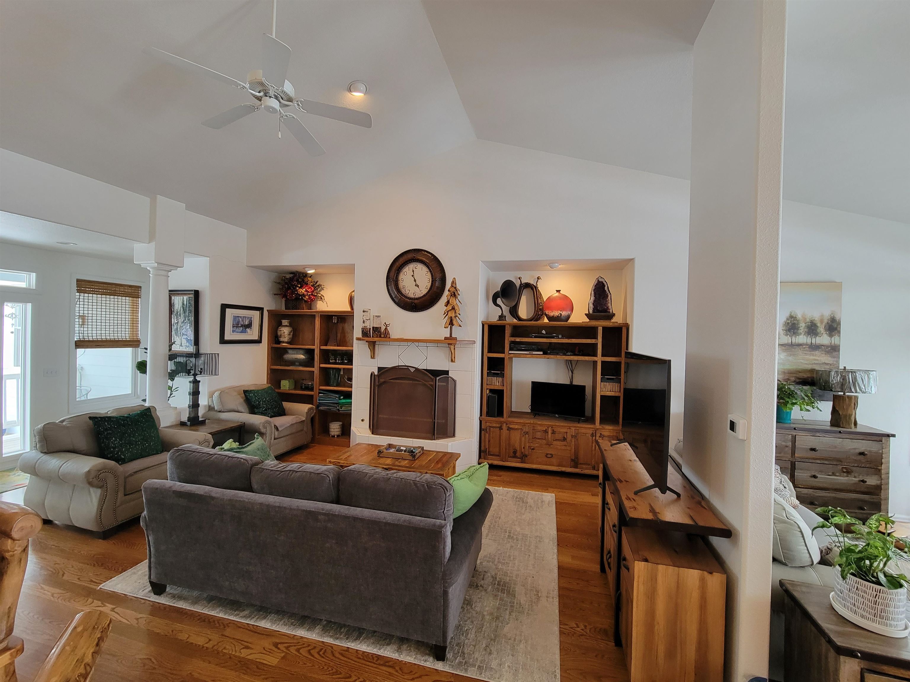 15753 Heavens View Road Cedaredge, CO 81413 - Photo 3 of 33 a living room with furniture and a flat screen tv