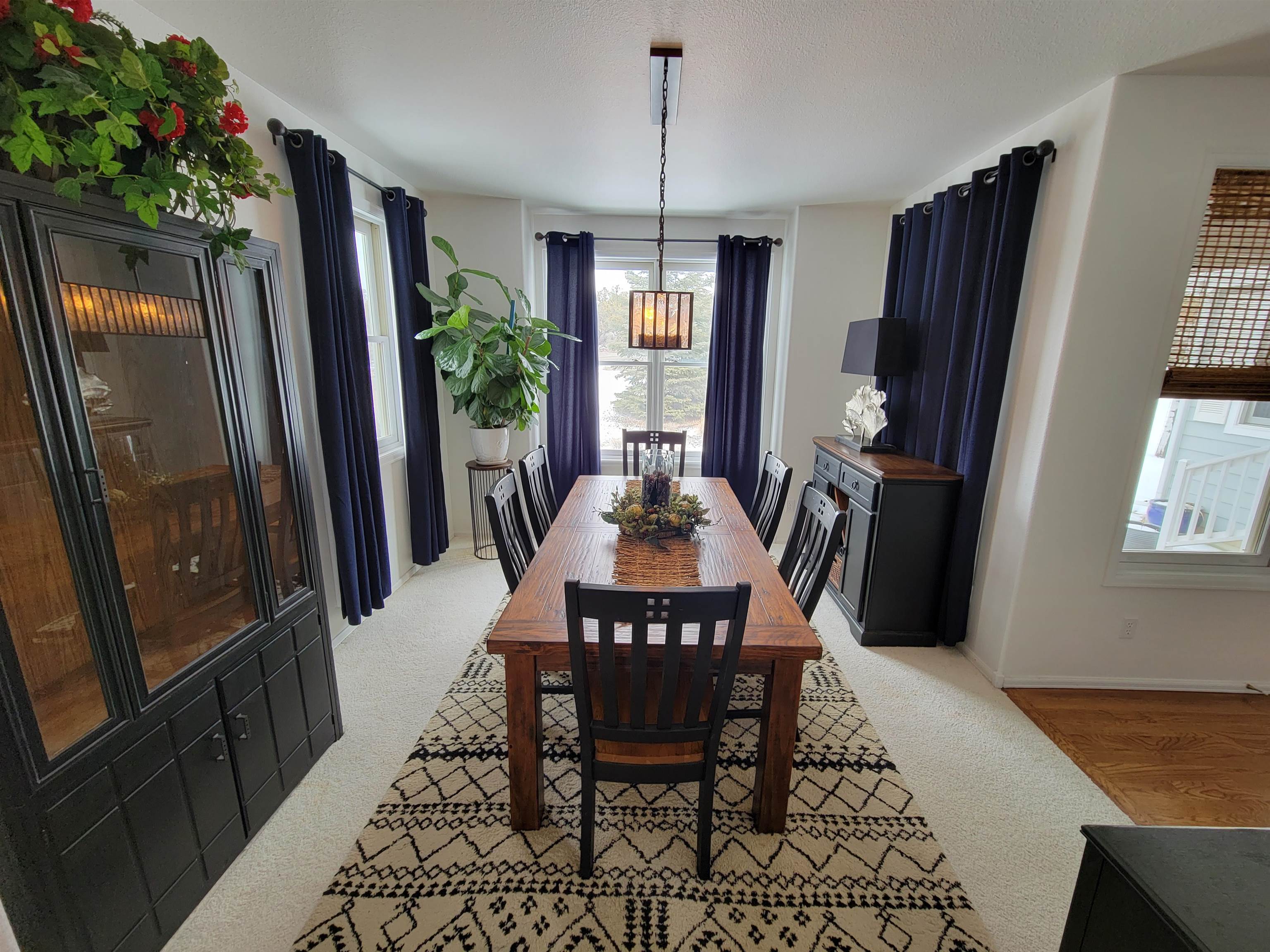 15753 Heavens View Road Cedaredge, CO 81413 - Photo 7 of 33 a view of a dining room with furniture window and wooden floor