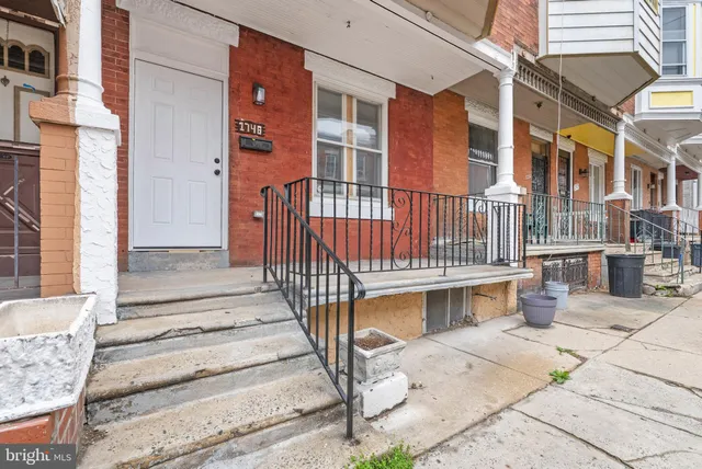 a view of a building with a bench