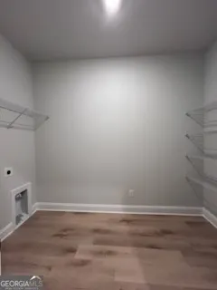 a view of a room with an empty space