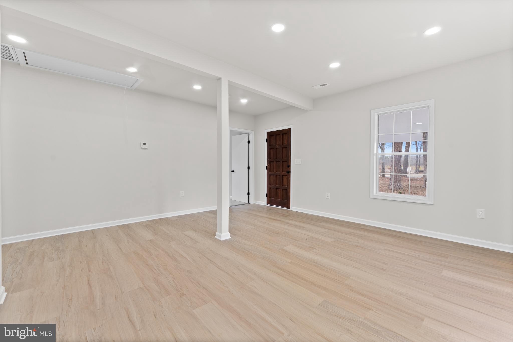 3578 Johnson Road Mineral, VA 23117 - Photo 13 of 27 a view of an empty room with wooden floor