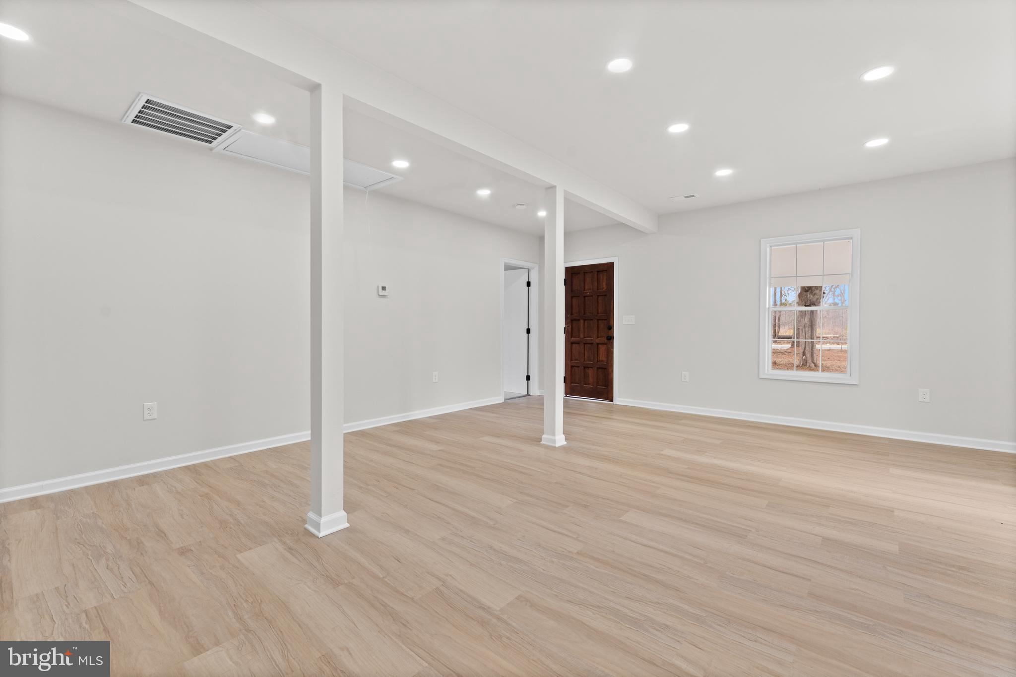 3578 Johnson Road Mineral, VA 23117 - Photo 17 of 27 a view of an empty room with wooden floor