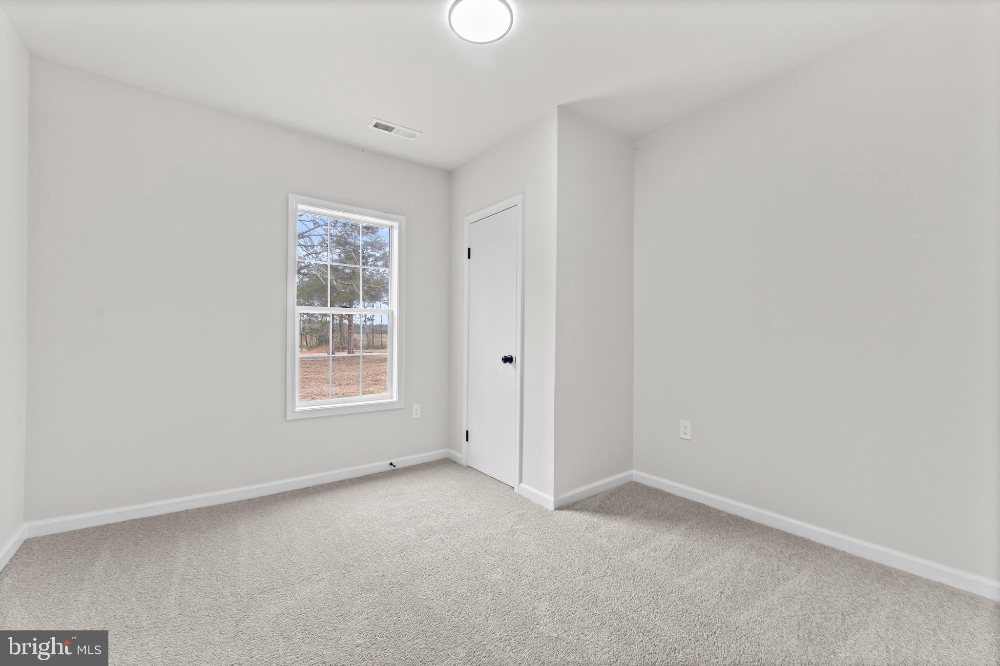 3578 Johnson Road Mineral, VA 23117 - Photo 18 of 27 an empty room with a window