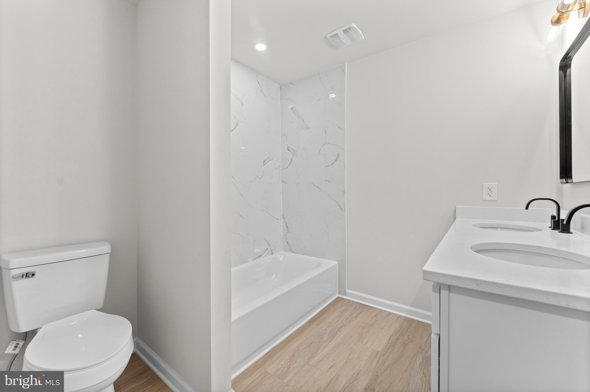 3578 Johnson Road Mineral, VA 23117 - Photo 20 of 27 a bathroom with a sink a toilet and shower