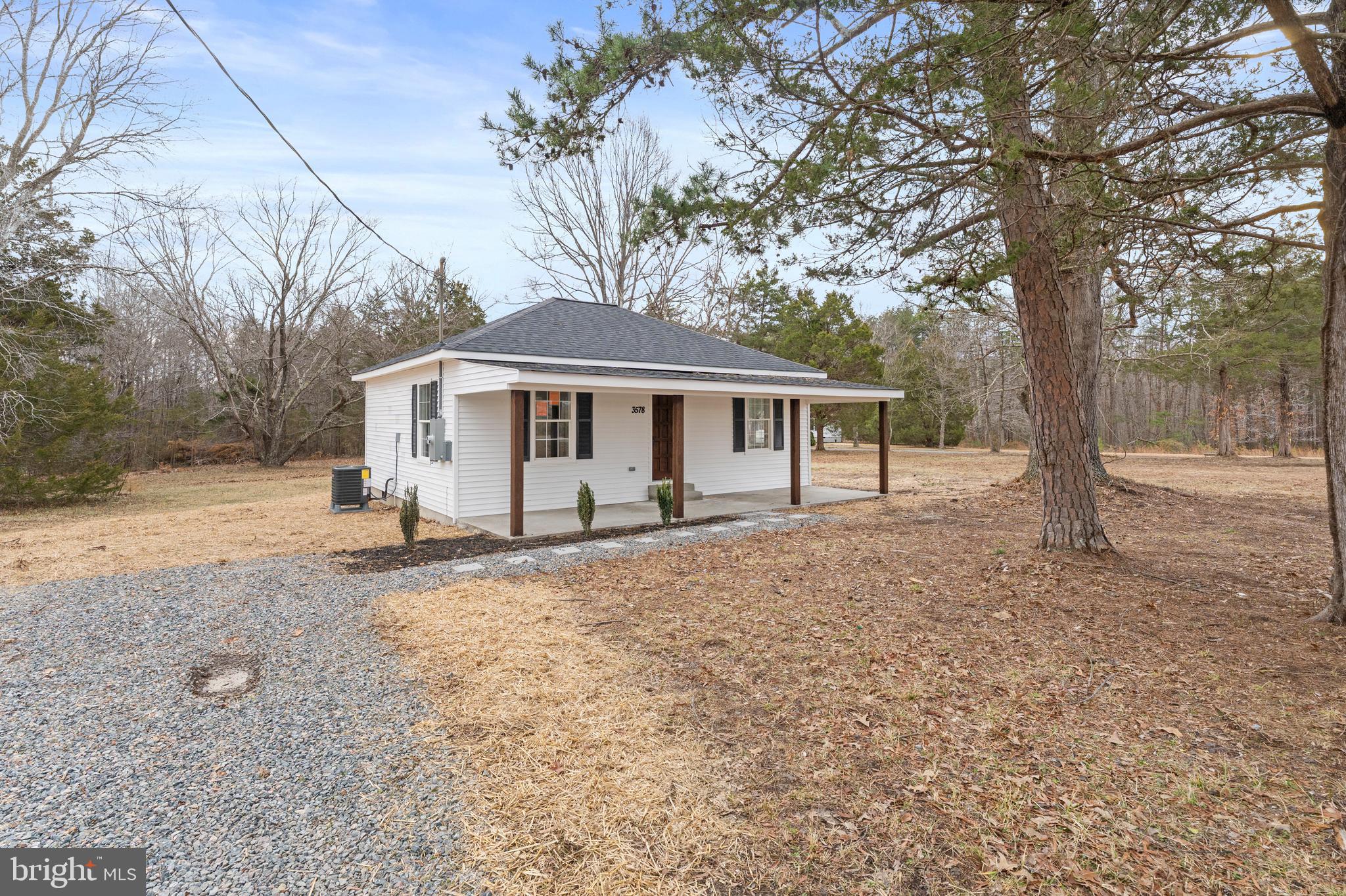 3578 Johnson Road Mineral, VA 23117 - Photo 2 of 27 a front view of a house with a garden
