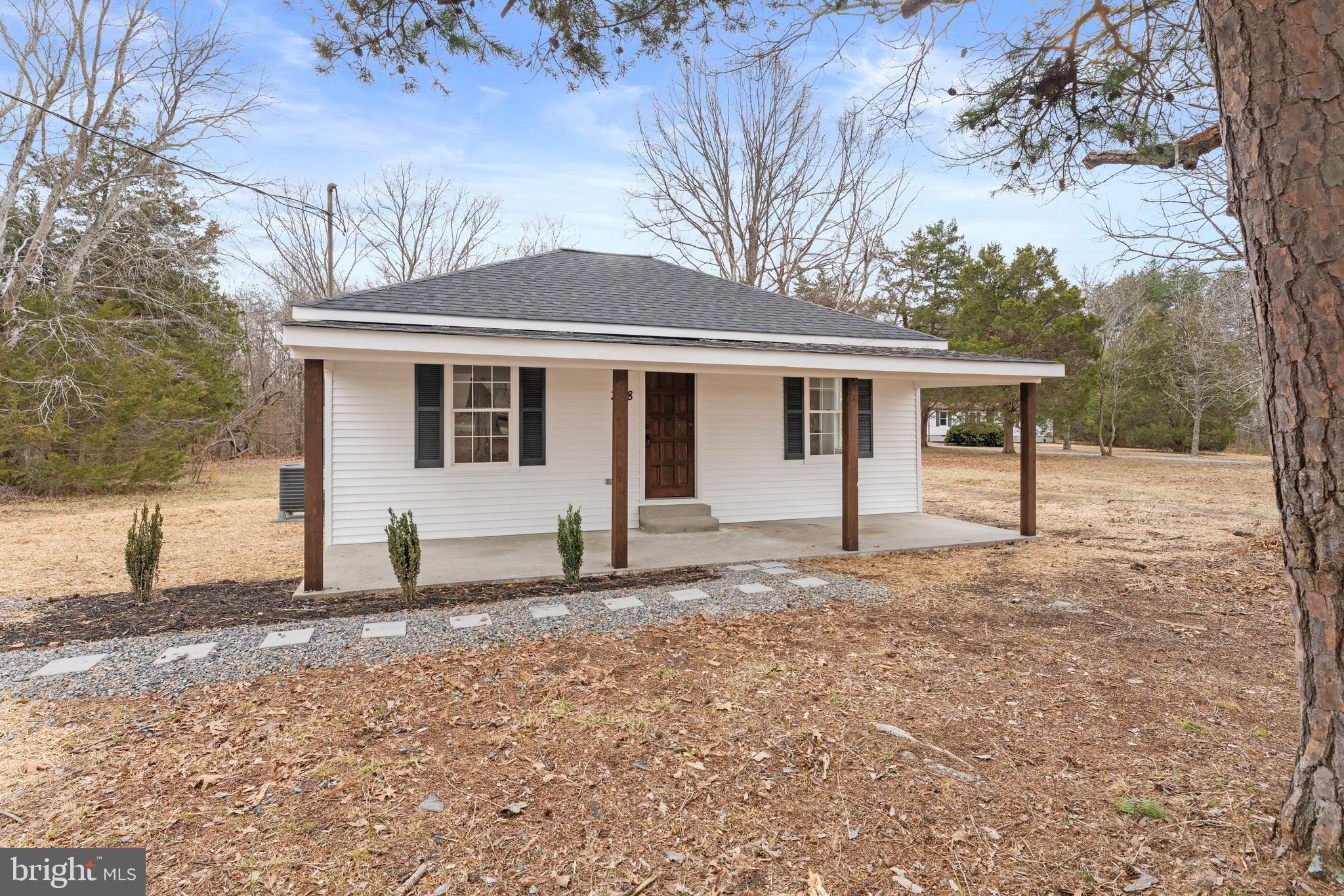 3578 Johnson Road Mineral, VA 23117 - Photo 3 of 27 a house with trees in the background