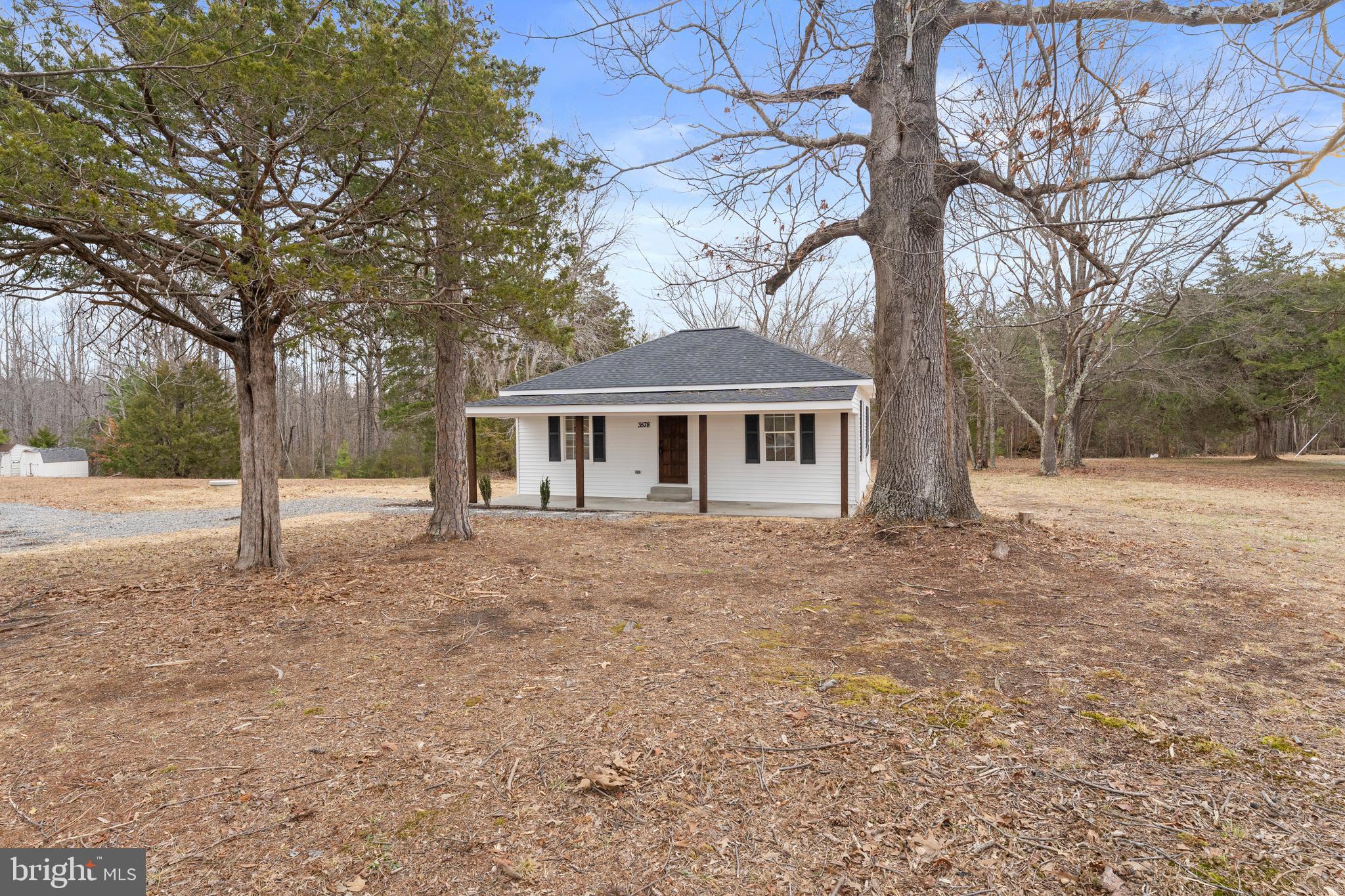 3578 Johnson Road Mineral, VA 23117 - Photo 5 of 27 a front view of house with a yard and trees