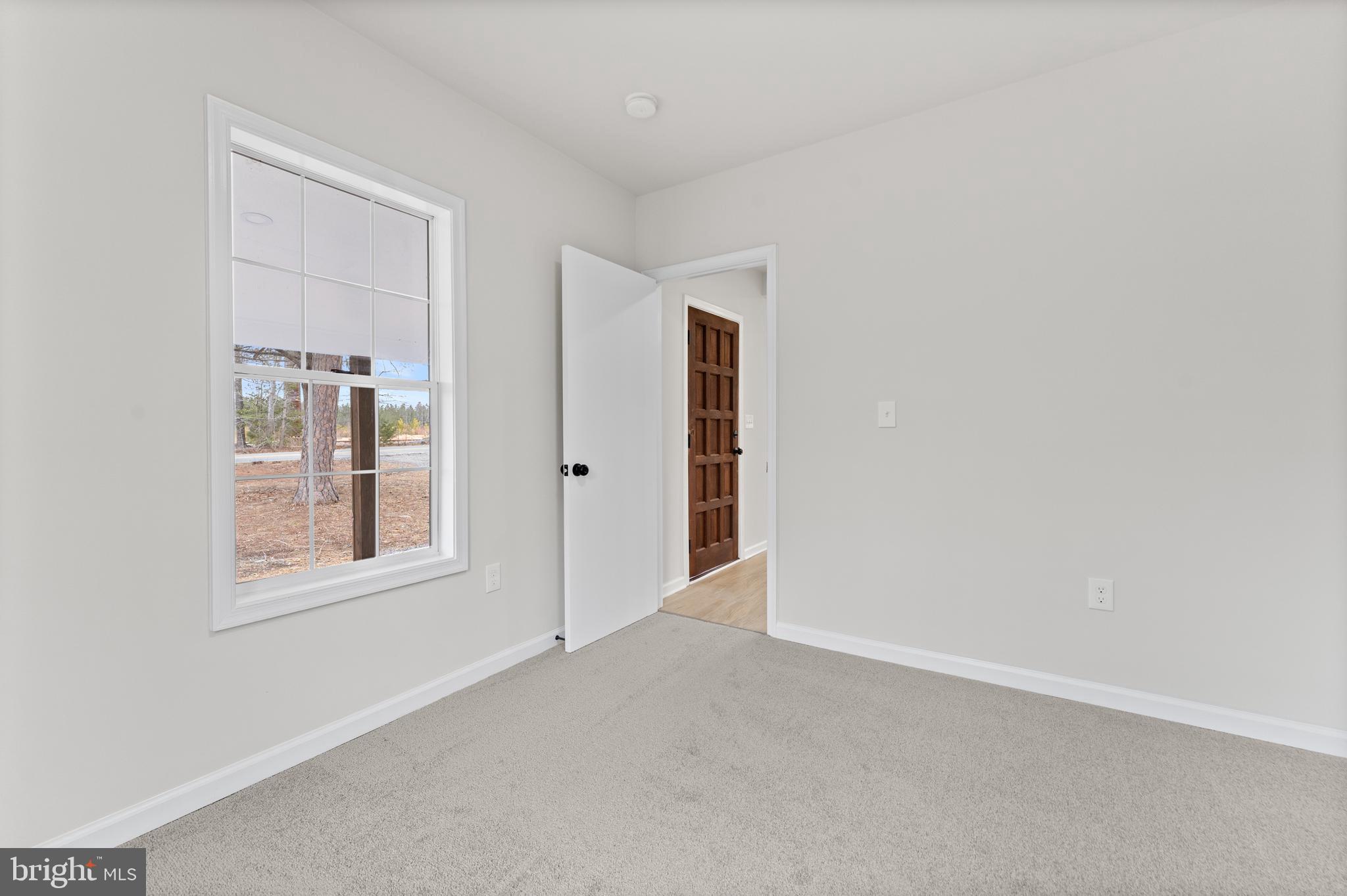 3578 Johnson Road Mineral, VA 23117 - Photo 10 of 27 a view of an empty room with window
