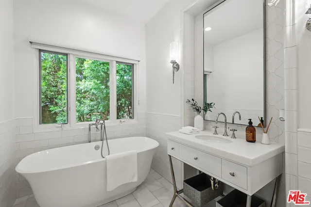 a bed room with a bed and a couch