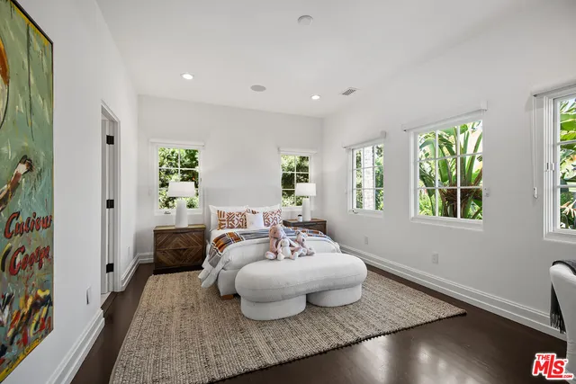 a view of house with outdoor space and swimming pool