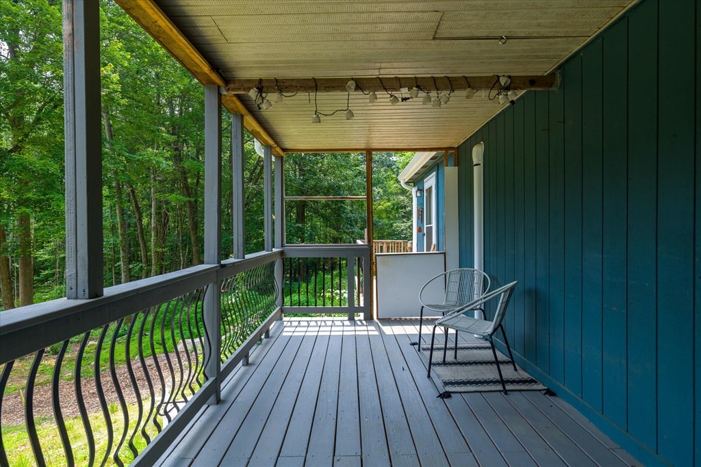 47 Barnes Road North Brookfield, MA 01535 - Photo 4 of 37 a view of balcony with furniture and wooden deck